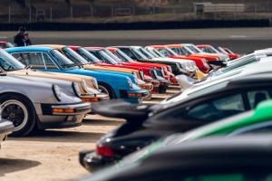 Several rows of air-cooled Porsche 911s at Rennsport Reunion 7