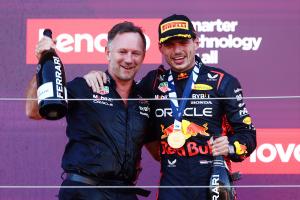 Christian Horner and Max Verstappen of Red Bull Racing celebrate victory in the 2023 Japanese Grand Prix
